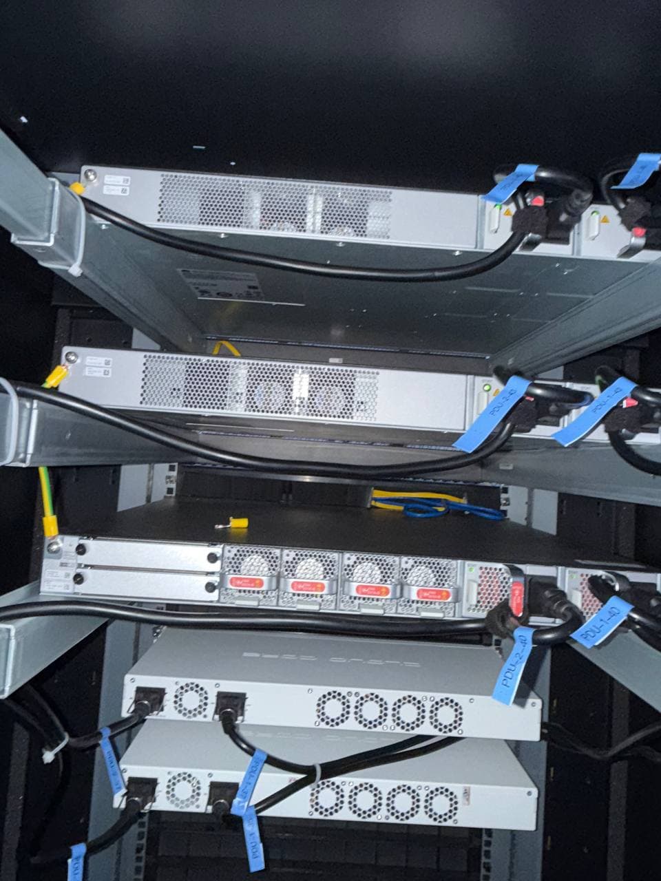 Core switch patched and labelled in a rack